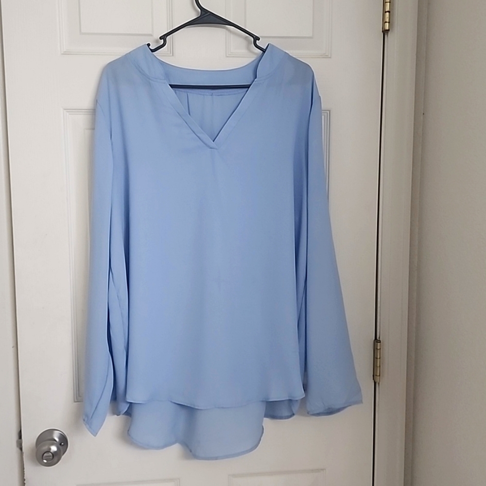 95 % Polyester 5 % Spandex Blouse